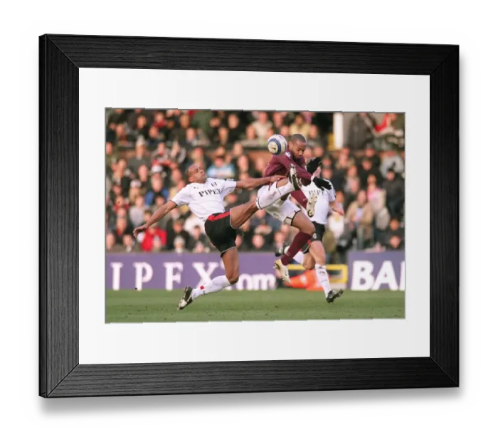 Framed Print : Thierry Henry (Arsenal) Alain Goma (Fulham). Fulham 0: 4 Arsenal. FA Premiership Framed Print : Thierry Henry (Arsenal) Alain Goma (Fulham). Fulham 0: 4 Arsenal. FA Premiership