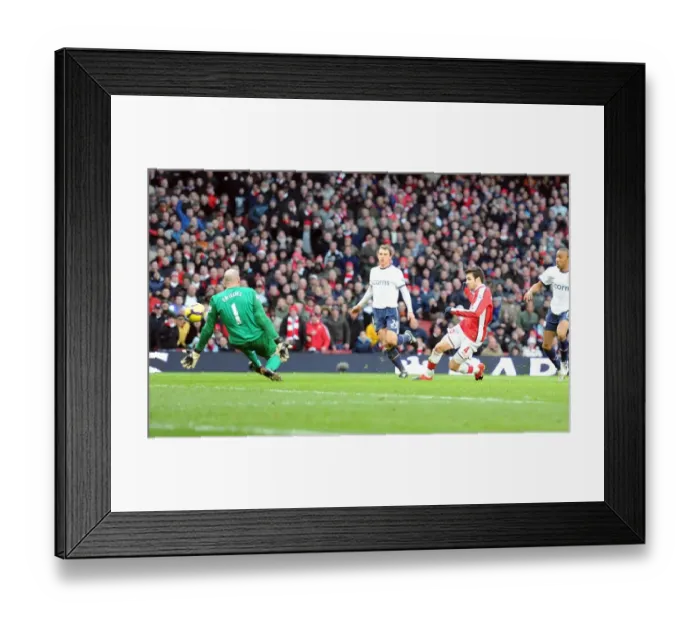 Framed Print : Cesc Fabregas shoots past Aston Villa goalkeeper Brad Friedel to score the 2nd Arsenal goal