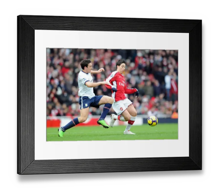 Framed Print : Arsenal's Samir Nasri Scores Against Stuart Downing and Aston Villa in 3-0 Premier League Victory at Emirates Stadium