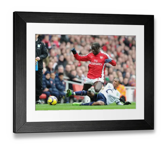 Framed Print : Bacary Sagna (Arsenal) Luke Young (Aston Villa). Arsenal 3: 0 Aston Villa Framed Print : Bacary Sagna (Arsenal) Luke Young (Aston Villa). Arsenal 3: 0 Aston Villa