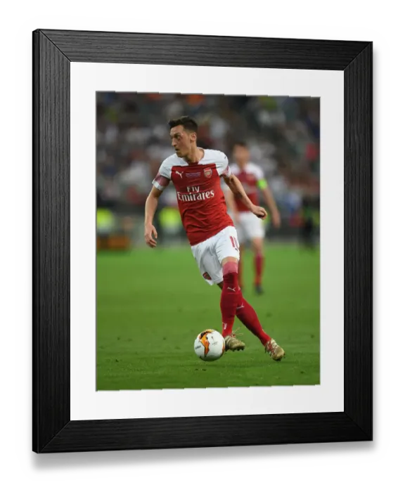 Framed Print : Arsenal's Mesut Ozil in Action: Europa League Final Showdown against Chelsea, Baku 2019 Framed Print : Arsenal's Mesut Ozil in Action: Europa League Final Showdown against Chelsea, Baku 2019