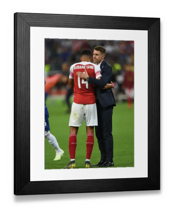Framed Print : Arsenal's Agony: Aubameyang Consoled by Ramsey after Europa League Final Defeat vs Chelsea (Baku, 2019) Framed Print : Arsenal's Agony: Aubameyang Consoled by Ramsey after Europa League Final Defeat vs Chelsea (Baku, 2019)