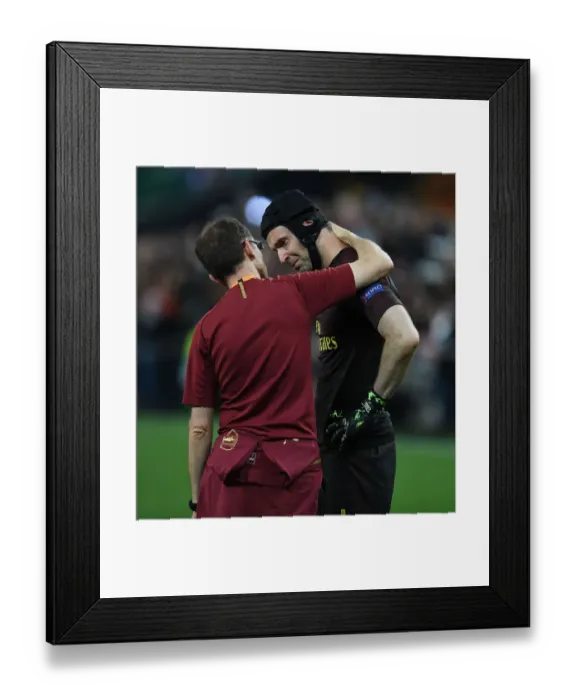 Framed Print : Bittersweet End: Cech Consoled by Garcia after Arsenal's Europa League Defeat to Chelsea