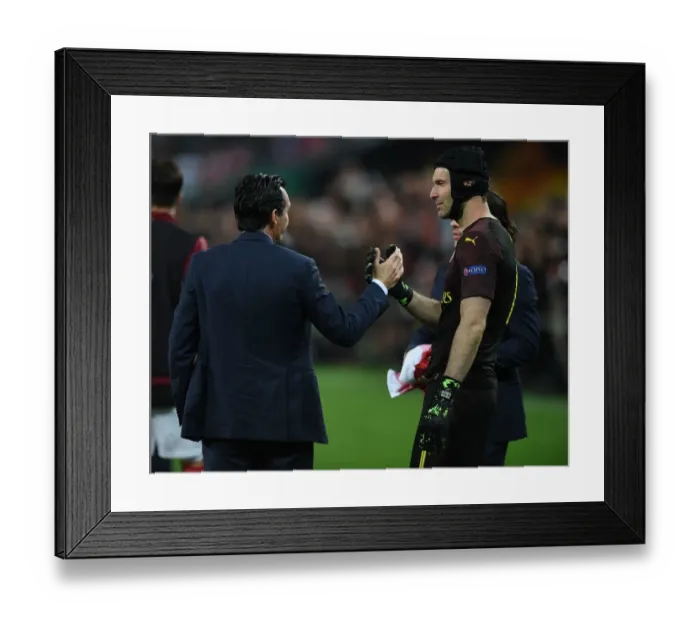 Framed Print : Arsenal's Agony: Unai Emery and Petr Cech Consoled After Europa League Defeat to Chelsea