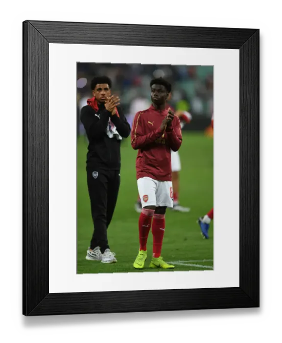 Framed Print : Arsenal's Bukayo Saka Celebrates Europa League Final Victory over Chelsea in Baku Framed Print : Arsenal's Bukayo Saka Celebrates Europa League Final Victory over Chelsea in Baku