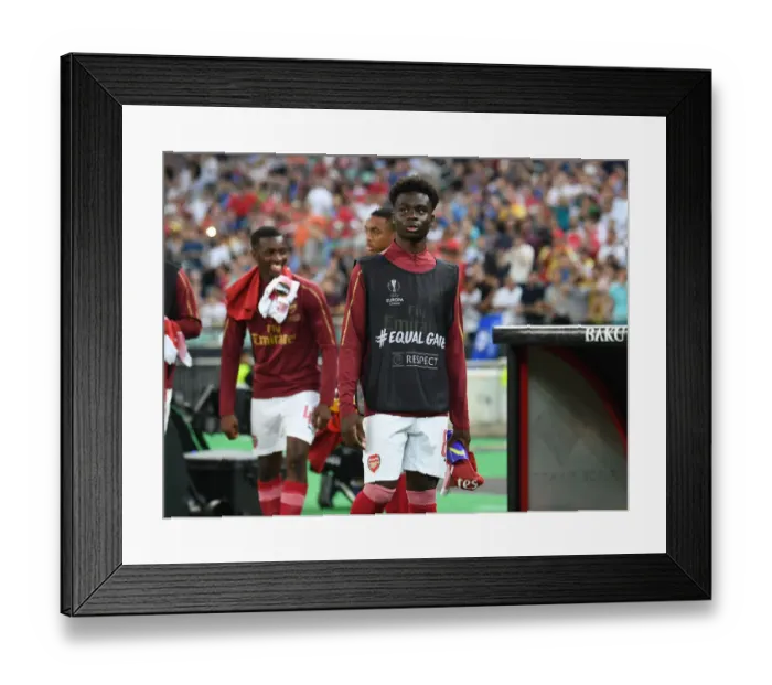 Framed Print : Arsenal's Bukayo Saka Prepares for Europa League Showdown Against Chelsea