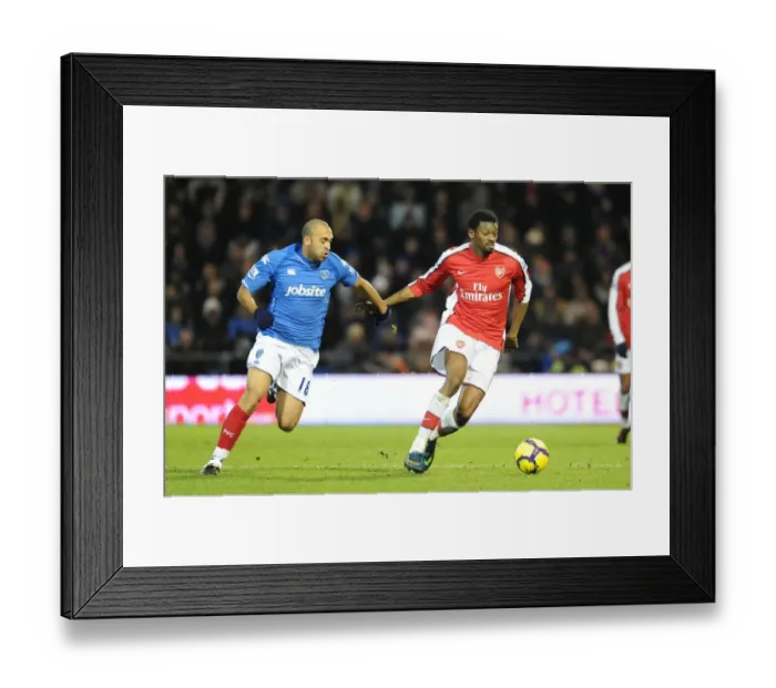 Framed Print : Abou Diaby (Arsenal) Anthony Vanden Borre (Portsmouth). Portsmouth 1: 4 Arsenal Framed Print : Abou Diaby (Arsenal) Anthony Vanden Borre (Portsmouth). Portsmouth 1: 4 Arsenal