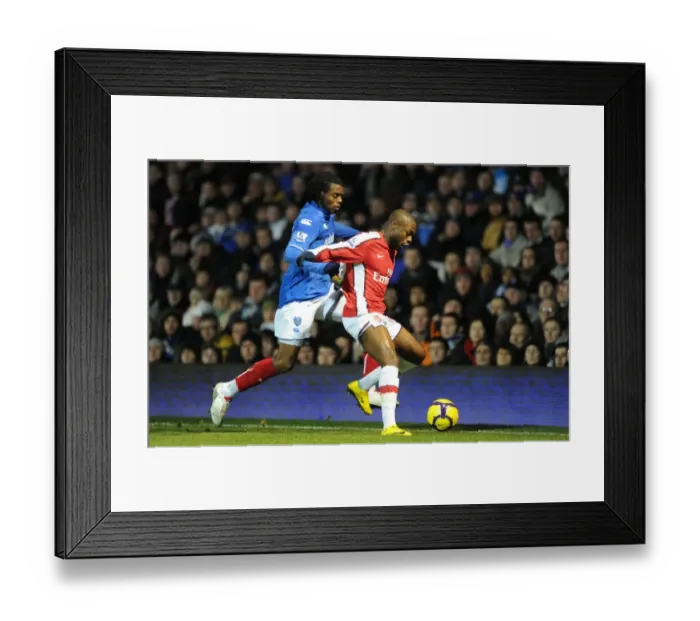 Framed Print : William Gallas (Arsenal) Frederic Piquionne (Portsmouth). Portsmouth 1: 4 Arsenal