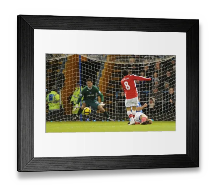 Framed Print : Samir Nasri shoots past Portsmouth goalkeeper Asmir Begovic to score the 2nd Arsenal goal Framed Print : Samir Nasri shoots past Portsmouth goalkeeper Asmir Begovic to score the 2nd Arsenal goal