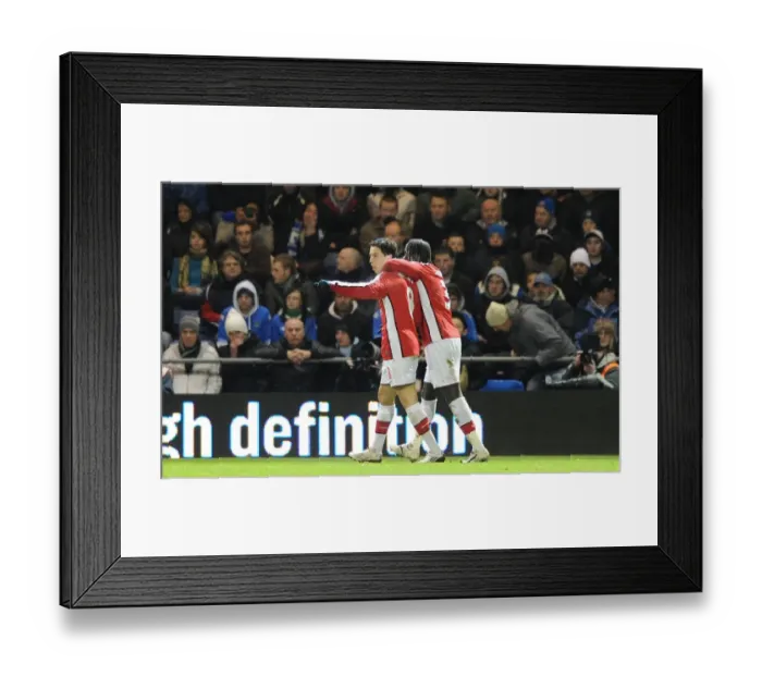 Framed Print : Samir Nasri celebrates scoring the 2nd Arsenal goal with Bacary Sagna. Portsmouth 1