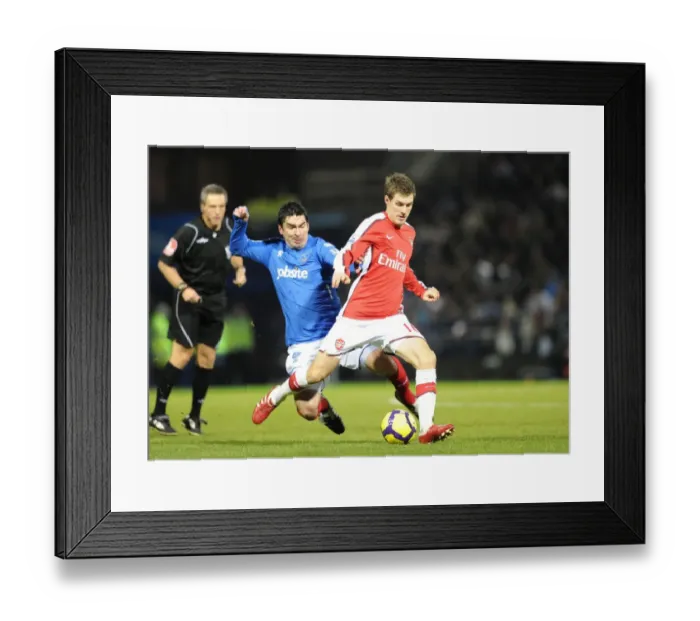 Framed Print : Arsenal's Aaron Ramsey Scores Three as Gunners Crush Portsmouth 4-1 Framed Print : Arsenal's Aaron Ramsey Scores Three as Gunners Crush Portsmouth 4-1
