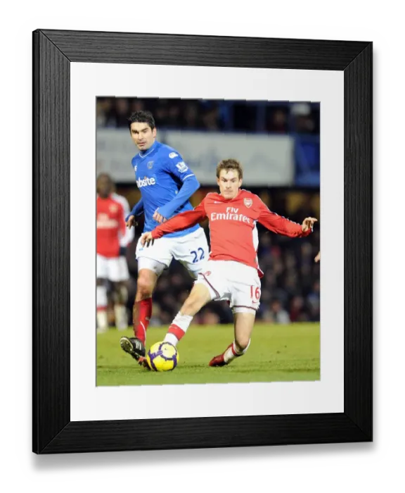 Framed Print : Aaron Ramsey's Hat-Trick: Arsenal Crush Portsmouth 4-1