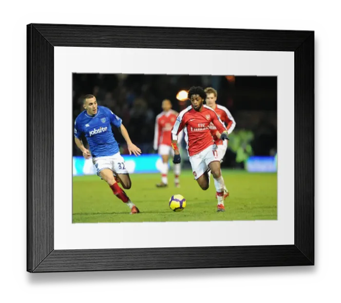 Framed Print : Alex Song (Arsenal) Hassan Yebda (Portsmouth). Portsmouth 1: 4 Arsenal, Barclays Premier League Framed Print : Alex Song (Arsenal) Hassan Yebda (Portsmouth). Portsmouth 1: 4 Arsenal, Barclays Premier League