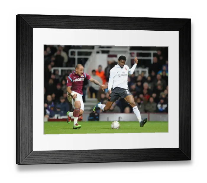 Framed Print : Abou Diaby (Arsenal) Julien Faubert (West Ham). West Ham United 1: 2 Arsenal