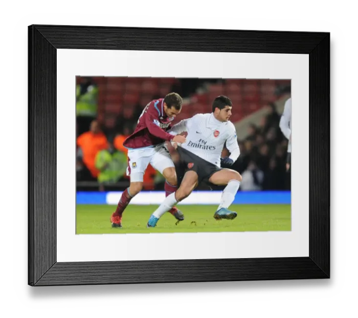 Framed Print : Fran Merida (Arsenal) Alessandro Diamanti (West Ham). West Ham United 1: 2 Arsenal Framed Print : Fran Merida (Arsenal) Alessandro Diamanti (West Ham). West Ham United 1: 2 Arsenal