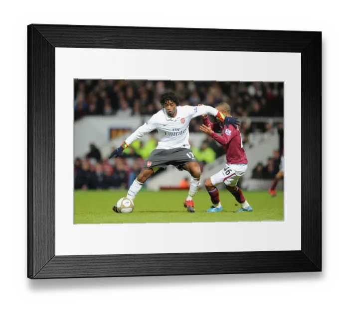 Framed Print : Alex Song (Arsenal) Junior Stanislas (West Ham). West Ham United 1: 2 Arsenal