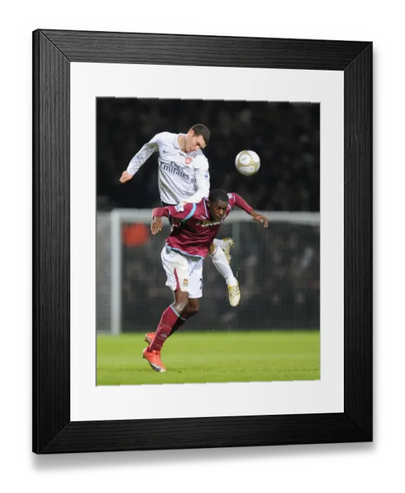 Framed Print : Thomas Vermaelen (Arsenal) Frank Nouble (West Ham). West Ham United 1: 2 Arsenal