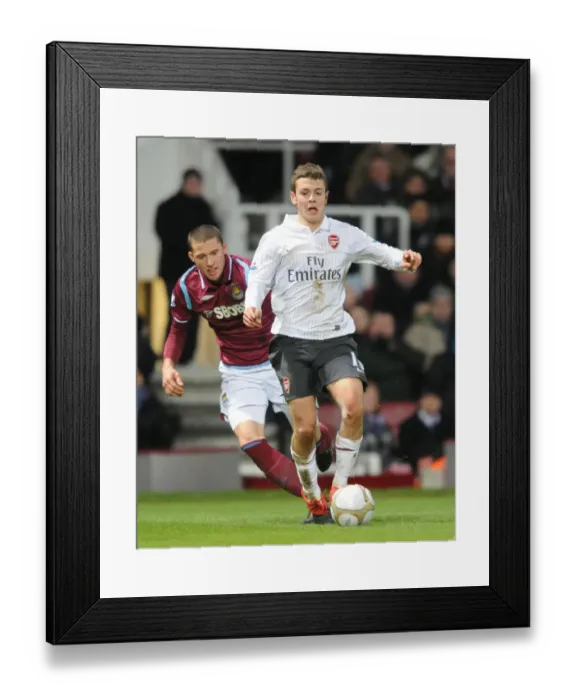 Framed Print : Jack Wilshere (Arsenal) Fabio Daprela (West Ham). West Ham United 1: 2 Arsenal Framed Print : Jack Wilshere (Arsenal) Fabio Daprela (West Ham). West Ham United 1: 2 Arsenal