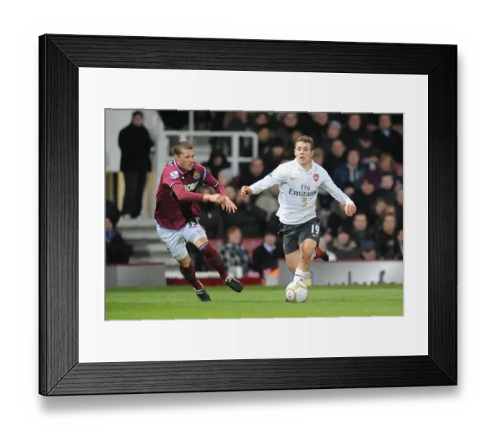Framed Print : Jack Wilshere's Game-Winning Goal: Arsenal Advances in FA Cup over West Ham