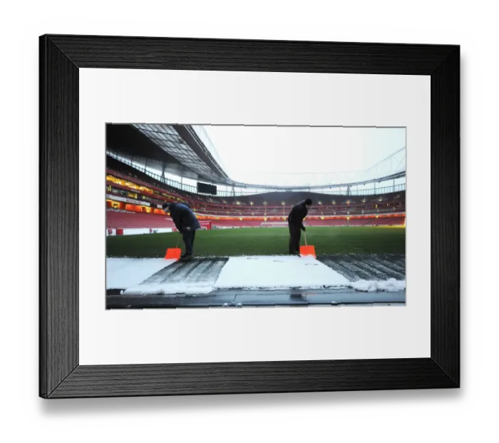 Framed Print : Winter's Embrace at Emirates: Arsenal's Stadium Transformed in Snow