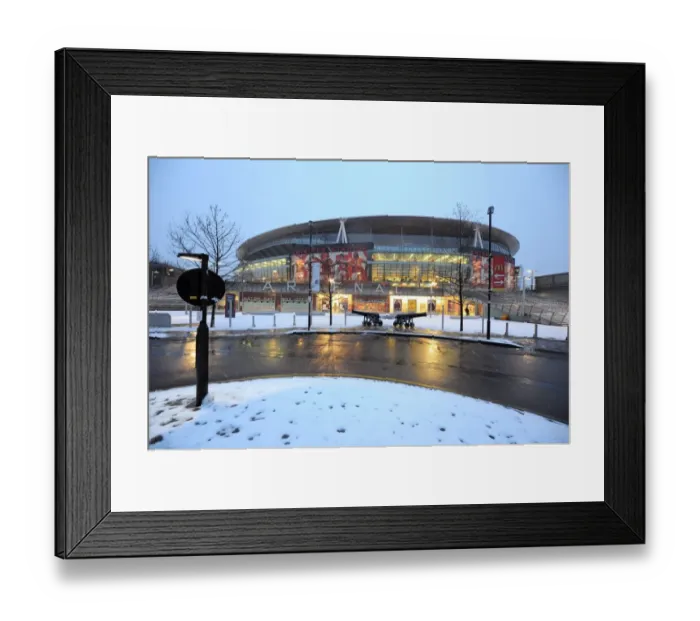 Framed Print : Winter's Embrace at Emirates: Arsenal's Stadium Transformed in Snow