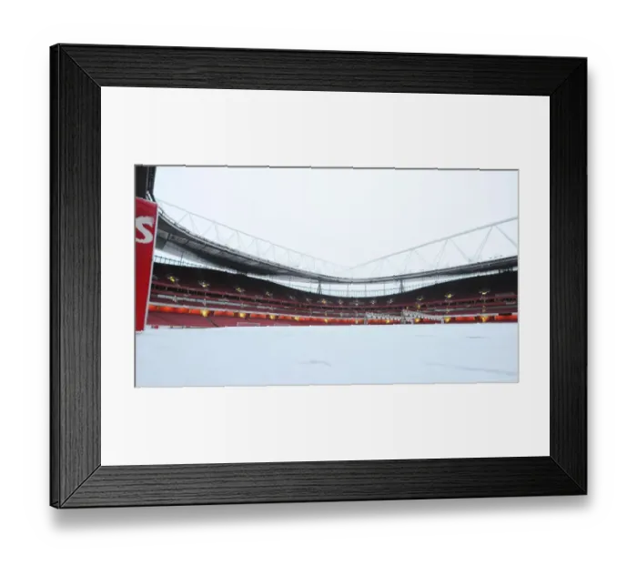 Framed Print : Winter's Embrace at Emirates: Arsenal's Stadium Transformed in Snow