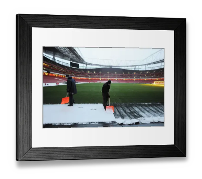 Framed Print : Winter's Embrace at Emirates: Arsenal's Stadium Transformed in Snow