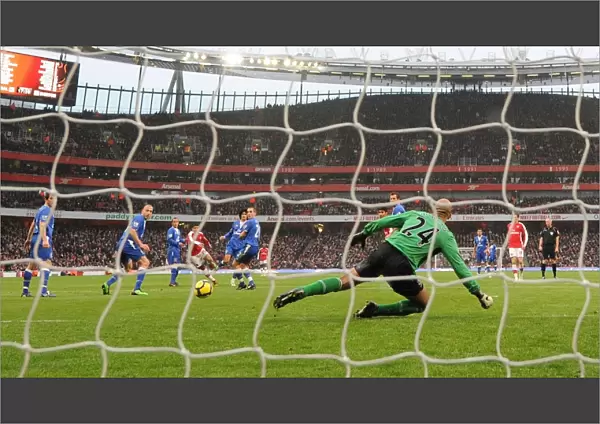 Denilson shoots past Everton goalkeeper Tim Howard to score the 1st Arsenal goal