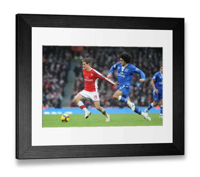 Framed Print : Aaron Ramsey (Arsenal) Marouane Fellaini (Everton). Arsenal 2: 2 Everton Framed Print : Aaron Ramsey (Arsenal) Marouane Fellaini (Everton). Arsenal 2: 2 Everton