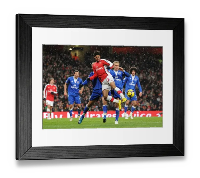 Framed Print : Carlos Vela (Arsenal) Phil Neville (Everton). Arsenal 2: 2 Everton, Barclays Premier League Framed Print : Carlos Vela (Arsenal) Phil Neville (Everton). Arsenal 2: 2 Everton, Barclays Premier League