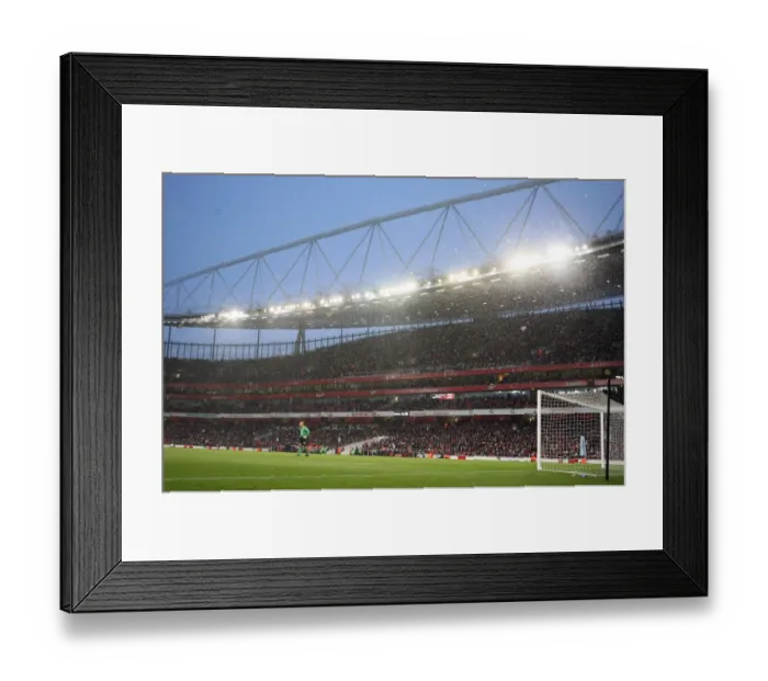 Framed Print : Snow falls during the match. Arsenal 2: 2 Everton. Barclays Premier League Framed Print : Snow falls during the match. Arsenal 2: 2 Everton. Barclays Premier League