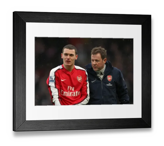 Framed Print : Thomas Vermaelen (Arsenal) with Physio Colin Lewin. Arsenal 2: 2 Everton Framed Print : Thomas Vermaelen (Arsenal) with Physio Colin Lewin. Arsenal 2: 2 Everton