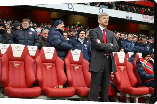 Arsene Wenger the Arsenal Manager with JK (Masseur) to his right. Arsenal 2: 2 Everton