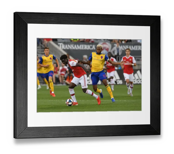 Framed Print : Saka vs. Acosta: A Battle in the Arsenal Pre-Season Clash (Colorado Rapids vs. Arsenal, 2019) Framed Print : Saka vs. Acosta: A Battle in the Arsenal Pre-Season Clash (Colorado Rapids vs. Arsenal, 2019)
