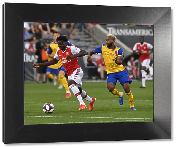 Arsenal's Bukayo Saka Faces Off Against Colorado Rapids Kellyn Acosta in 2019-20 Clash