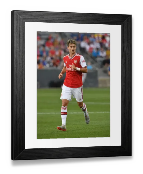 Framed Print : Arsenal's Robbie Burton in Action Against Colorado Rapids Framed Print : Arsenal's Robbie Burton in Action Against Colorado Rapids