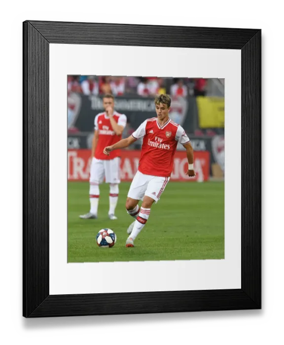Framed Print : Arsenal's Robbie Burton in Action Against Colorado Rapids Framed Print : Arsenal's Robbie Burton in Action Against Colorado Rapids
