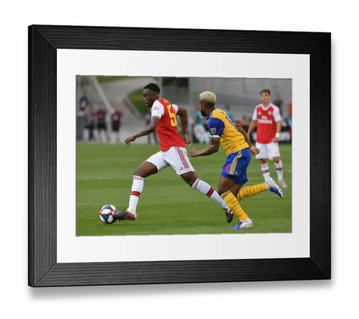 Framed Print : Arsenal vs Colorado Rapids: James Olayinka vs Kellyn Acosta Clash in Commerce City Framed Print : Arsenal vs Colorado Rapids: James Olayinka vs Kellyn Acosta Clash in Commerce City