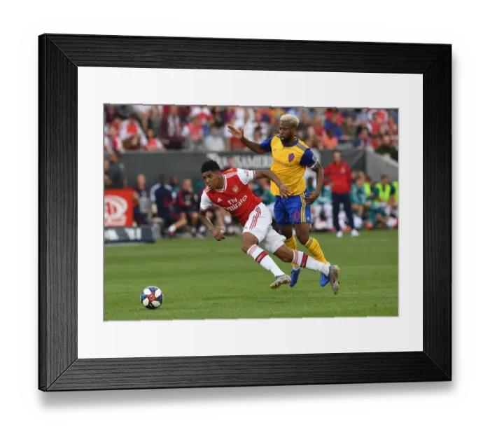 Framed Print : Arsenal's Tyreece John-Jules Faces Off Against Colorado's Kellyn Acosta in 2019 Pre-Season Clash Framed Print : Arsenal's Tyreece John-Jules Faces Off Against Colorado's Kellyn Acosta in 2019 Pre-Season Clash