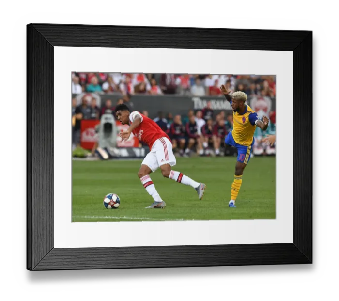 Framed Print : Arsenal's Tyreece John-Jules vs. Kellyn Acosta: A Battle in the 2019 Arsenal vs. Colorado Rapids Pre-Season Clash