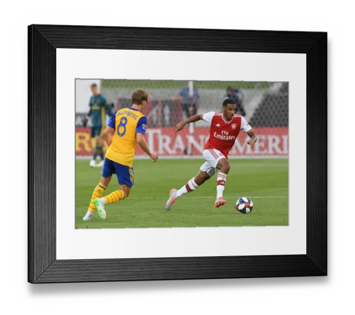 Framed Print : Arsenal's Dominic Thompson in Action Against Colorado Rapids