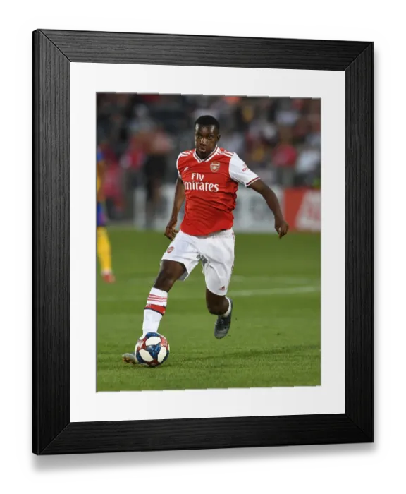 Framed Print : Arsenal's Eddie Nketiah in Action Against Colorado Rapids (2019-20) Framed Print : Arsenal's Eddie Nketiah in Action Against Colorado Rapids (2019-20)