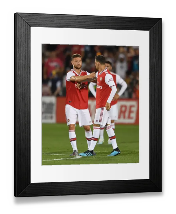 Framed Print : Arsenal's Mesut Ozil Receives Captain's Armband from Shkodran Mustafi during Colorado Rapids Match, 2019