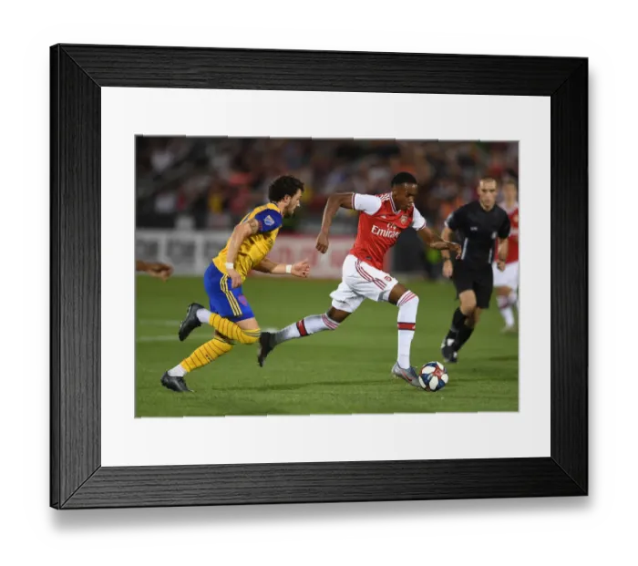 Framed Print : Arsenal's Joe Willock Faces Off Against Colorado's Jordan Schweitzer in 2019 Pre-Season Clash Framed Print : Arsenal's Joe Willock Faces Off Against Colorado's Jordan Schweitzer in 2019 Pre-Season Clash
