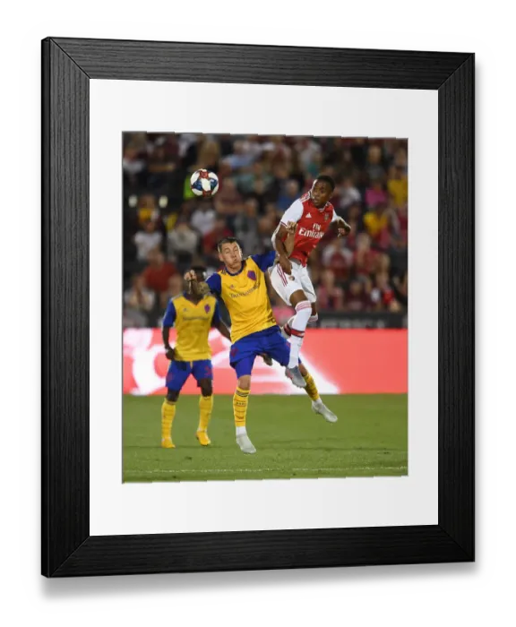 Framed Print : Arsenal's Joe Willock in Action Against Colorado Rapids Framed Print : Arsenal's Joe Willock in Action Against Colorado Rapids