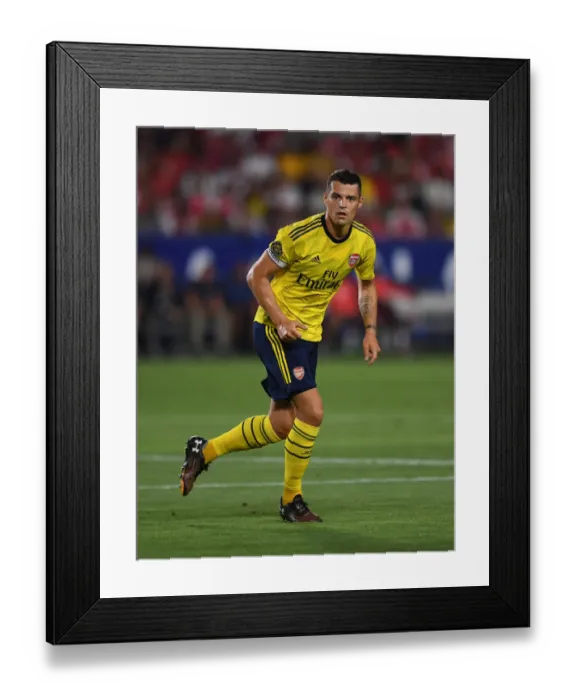 Framed Print : Granit Xhaka vs Bayern Munich: Arsenal's Midfield Battle in 2019 US Pre-Season Clash