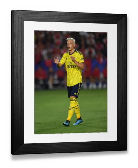 Framed Print : Arsenal vs Bayern Munich Showdown: Mesut Ozil's Battle in the 2019 International Champions Cup, Los Angeles