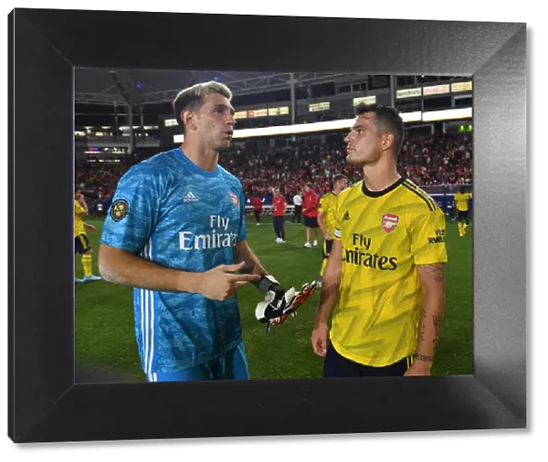 Arsenal Pre-Season: Emi Martinez and Granit Xhaka Connect Amidst Bayern Munich Rivalry