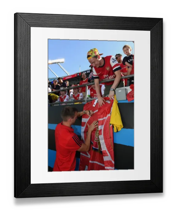 Framed Print : Arsenal's Rob Holding Signs Autographs Before Arsenal v Fiorentina in 2019 International Champions Cup, Charlotte