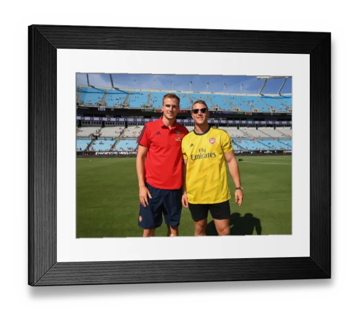 Framed Print : Arsenal's Rob Holding Meets NFL Star Christian McCaffrey at 2019 International Champions Cup in Charlotte Framed Print : Arsenal's Rob Holding Meets NFL Star Christian McCaffrey at 2019 International Champions Cup in Charlotte